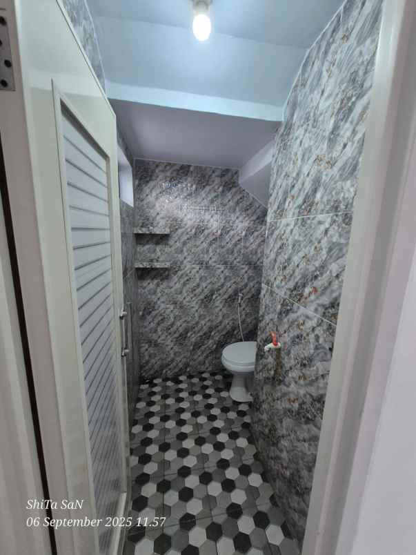 dijual rumah jln raya sawangan mampang