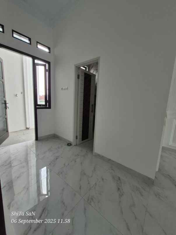 dijual rumah jln raya sawangan mampang