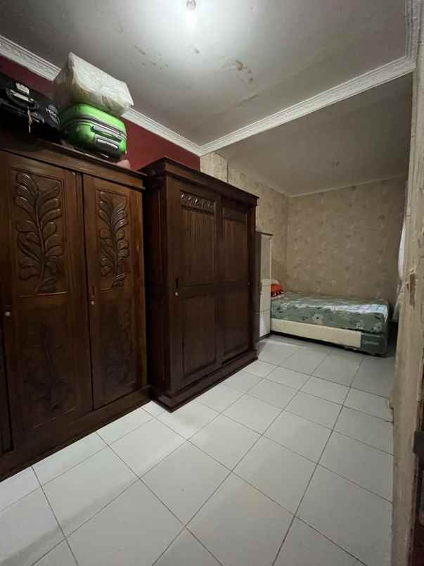 dijual rumah jln raya tole iskandar depok