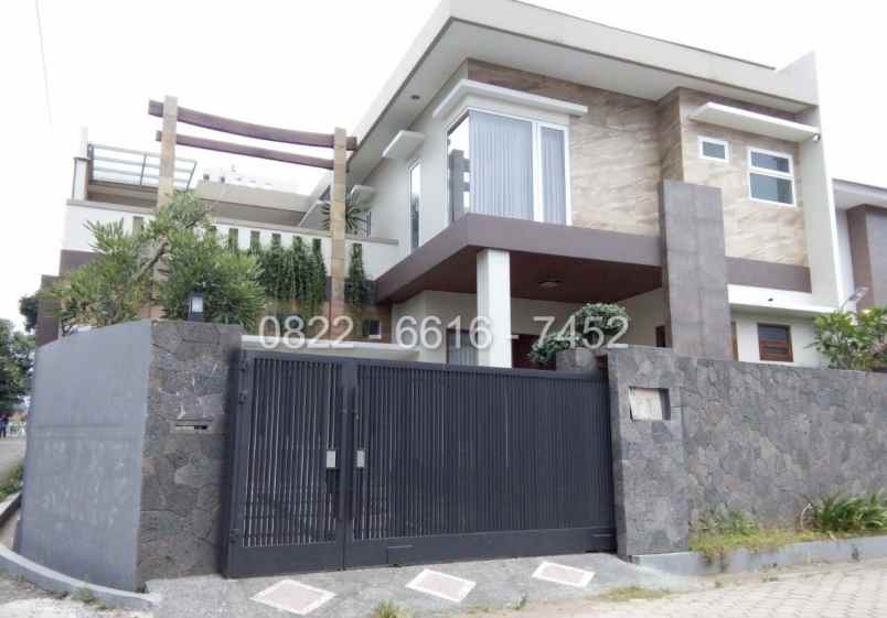 dijual rumah komplek sariwangi