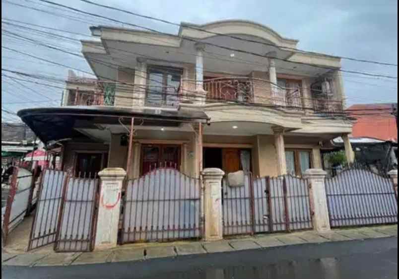 dijual rumah taman buaran indah 4