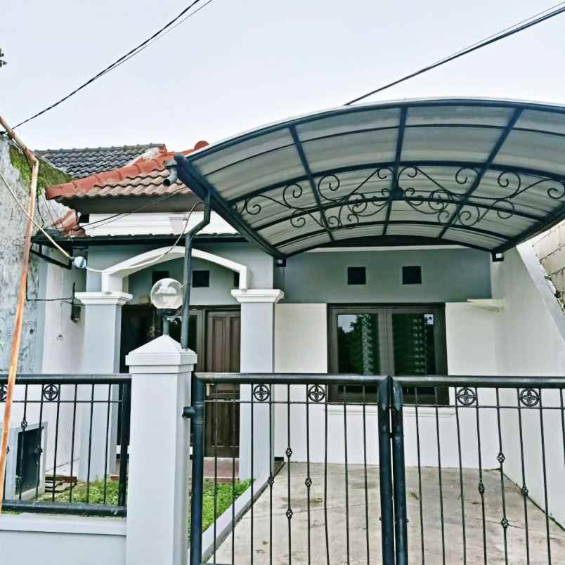 dijual rumah wiguna