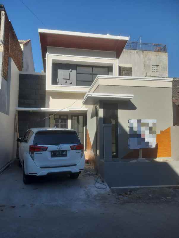 dijual rumah bukit cemara tidar