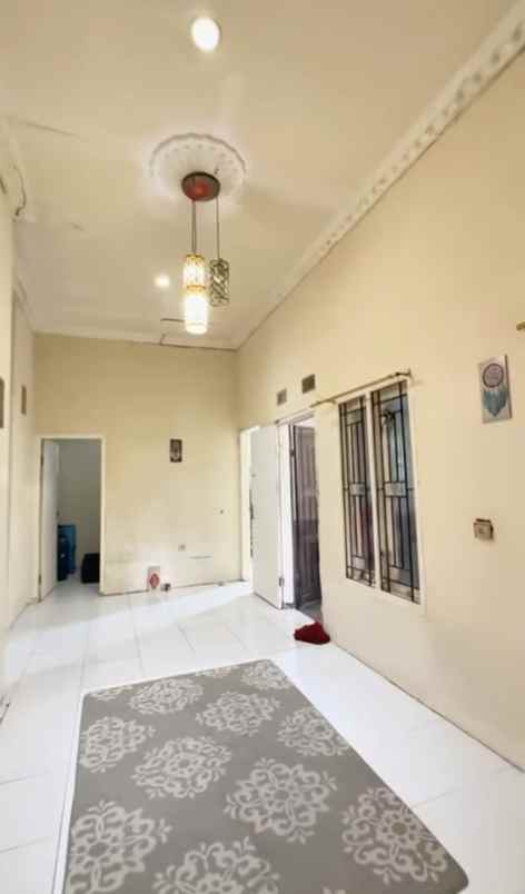 dijual rumah jl kalibaru cilodong