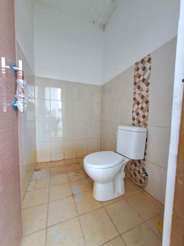 dijual rumah karang satria