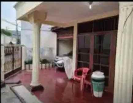 dijual rumah kayu putih