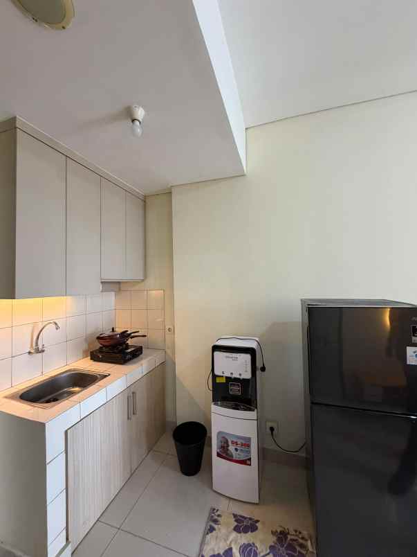 disewakan apartemen jl caman raya no 21