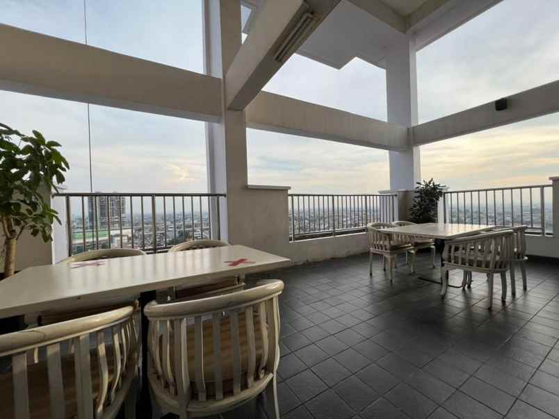 disewakan apartemen jl caman raya no 21