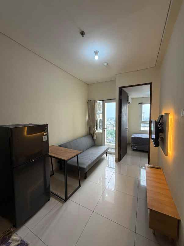 disewakan apartemen jl caman raya no 21