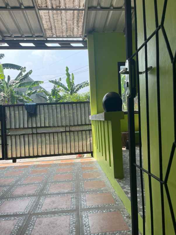 over kredit rumah di perumahan puri bukit depok