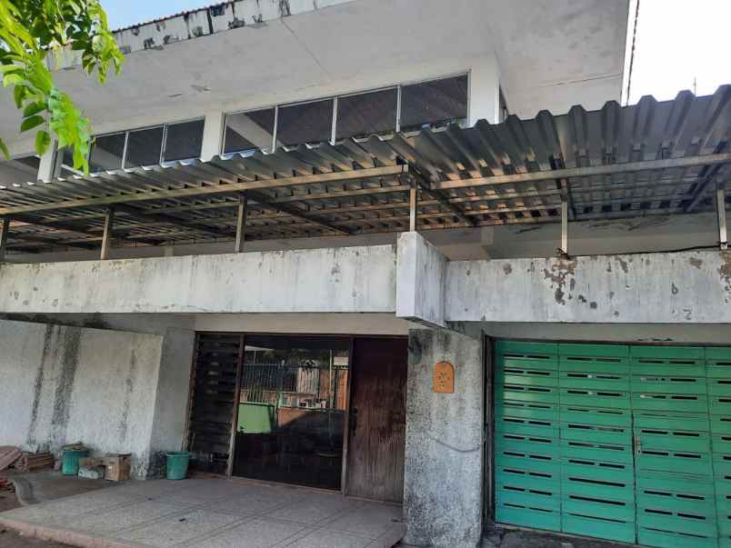 rumah manyar kertoarjo hadap selatan