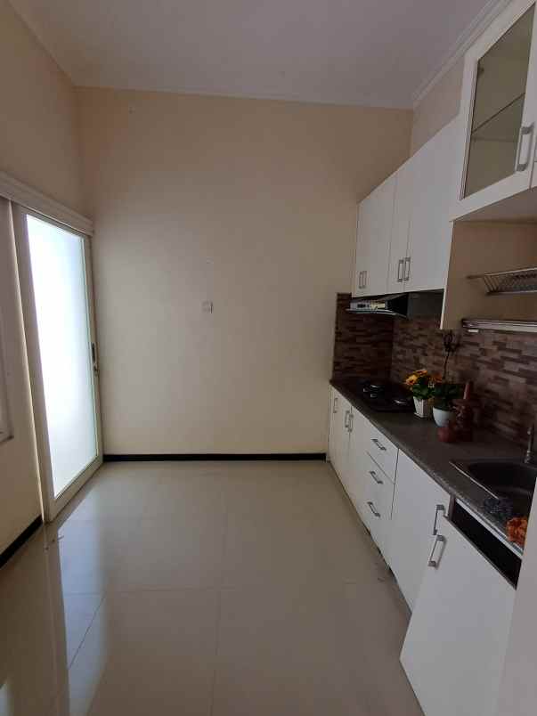 rumah taman rivera regency