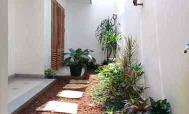 S764.Rumah Modern Tropis Kualitas Bata Merah Sentuhan Jati Blora Depok