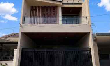 rumah babatan pantai new minimalis carport 2