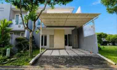 rumah woodland citraland siap huni semi furnished