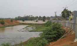 Tanah Strategis Pinggir Jalan Depan Komplek Perumahan